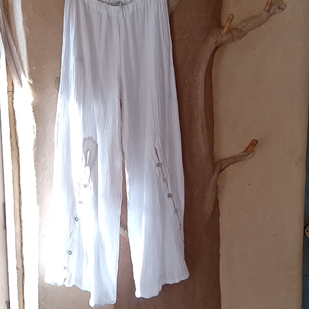 Beautiful button detail wide leg white oh my gauze semi sheer pants